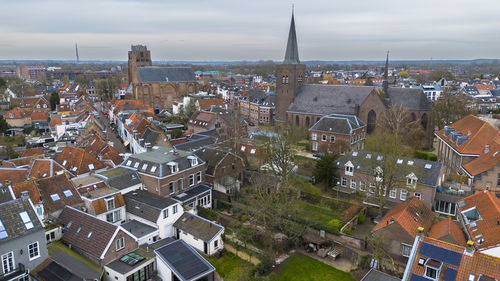 Beautiful view from above, from drone to orange, tiled roofs of houses. city of wijk bij duurstede. 