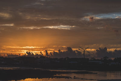 Scenic view of silhouette landscape against sky during sunset