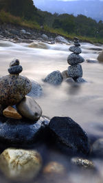 Stones on rocks at beach