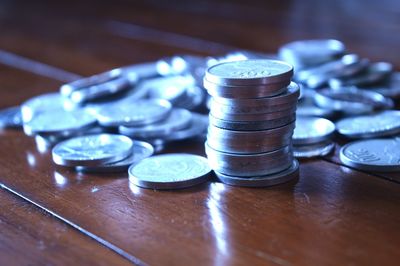 Close-up of coins on table