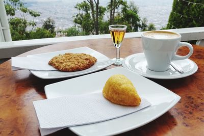 Close-up of breakfast served on table