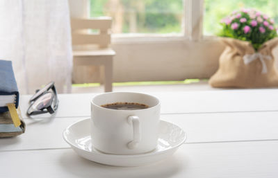 Coffee cup on table