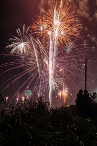 Firework display at night