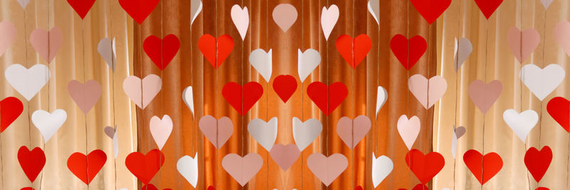 Banner. valentines day background with paper hearts. the red and white heart shapes for 14 february. 
