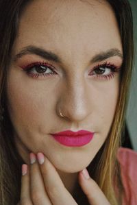 Portrait of beautiful young woman with make-up