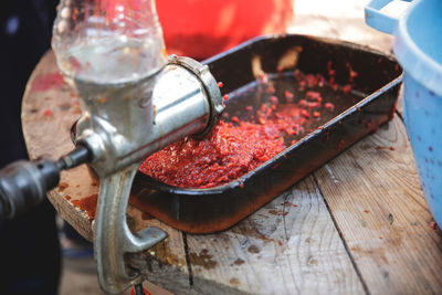 High angle view of meat in container on table