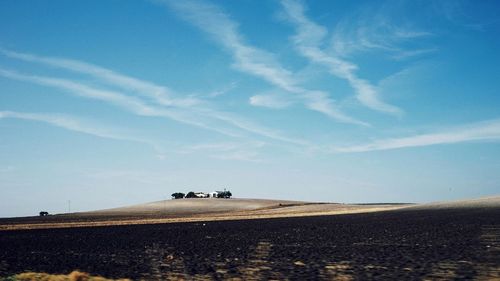 Scenic view of desert against sky