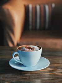 Coffee cup on table