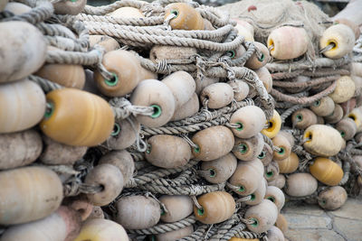 Close-up of ropes and buoys