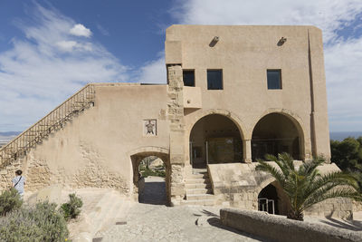 View of historical building against cloudy sky