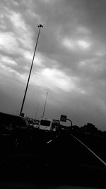 View of road against cloudy sky