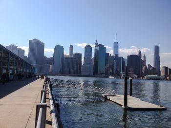 Modern buildings in city against clear sky