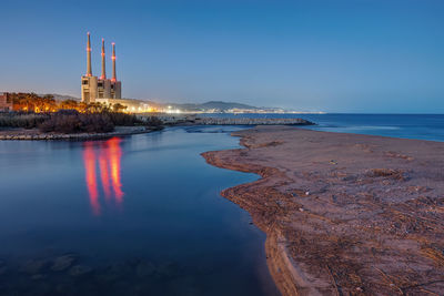 The shutdown thermal power station at sant adria near barcelona after sunset