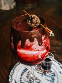 High angle view of strawberry in glass on table