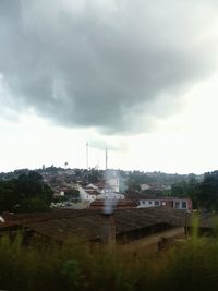 Built structure against cloudy sky