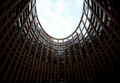 Low angle view of modern building against sky