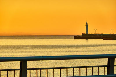 Scenic view of sea against sky during sunrise