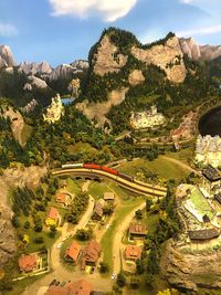 High angle view of houses and trees against sky