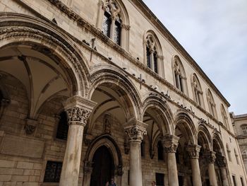 Low angle view of historical building against sky