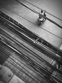 High angle view of people on railroad tracks