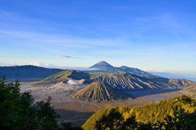 View of volcanic landscape against sky