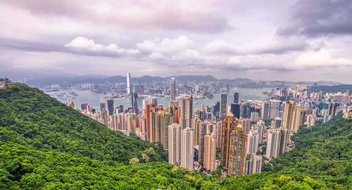 Aerial view of modern buildings in city against sky