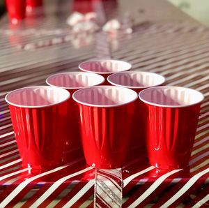 Close-up of wine glasses on table