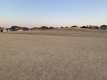 Scenic view of desert against clear sky