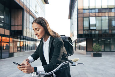 Young woman using mobile phone