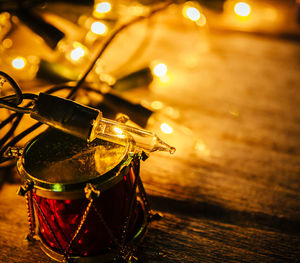 High angle view of illuminated string lights and decoration on table during christmas