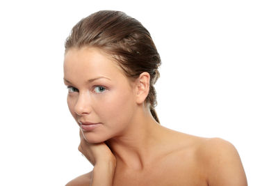 Portrait of a beautiful young woman over white background