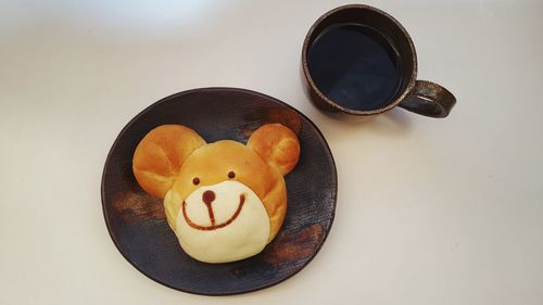 High angle view of coffee cup on table