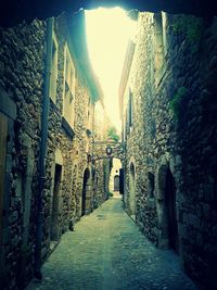 Narrow alley along buildings