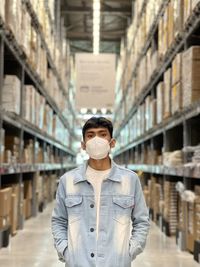 Portrait of man standing in store