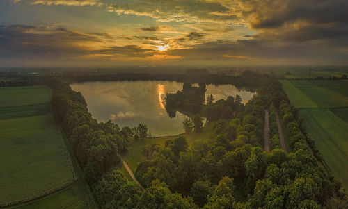 Scenic view of landscape against sky during sunset