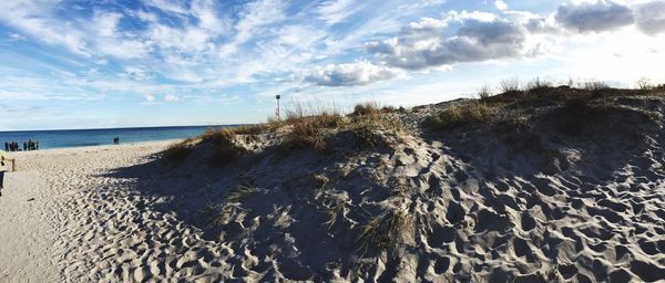 Scenic view of beach against sky