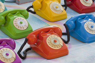 Close-up of old telephone on table