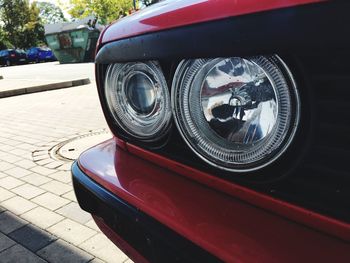 Close-up of vintage car on street