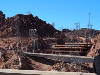 Hoover dam visitor center bidgeway to the dam  with the red rock  in. the background 