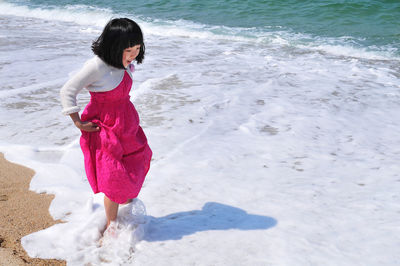 Full length of woman on beach