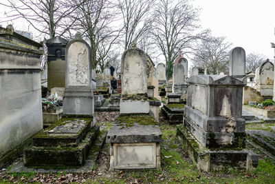 View of cemetery against built structure