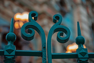 Close-up of metallic railing against blurred background