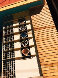 Low angle view of brick wall