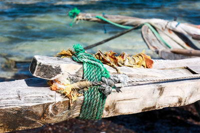 Close-up of fishing net on pier