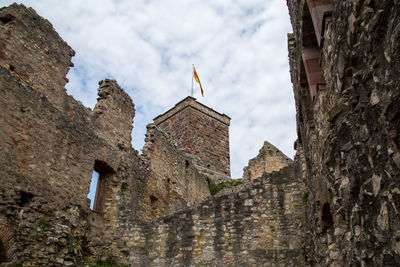 Low angle view of old building against sky