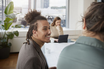 Smiling man in office