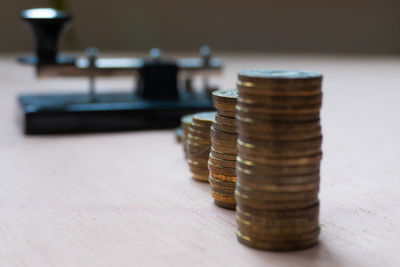 Close-up of coins on table