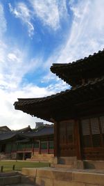 Built structure against cloudy sky