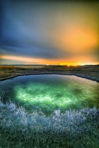 Scenic view of landscape at sunset