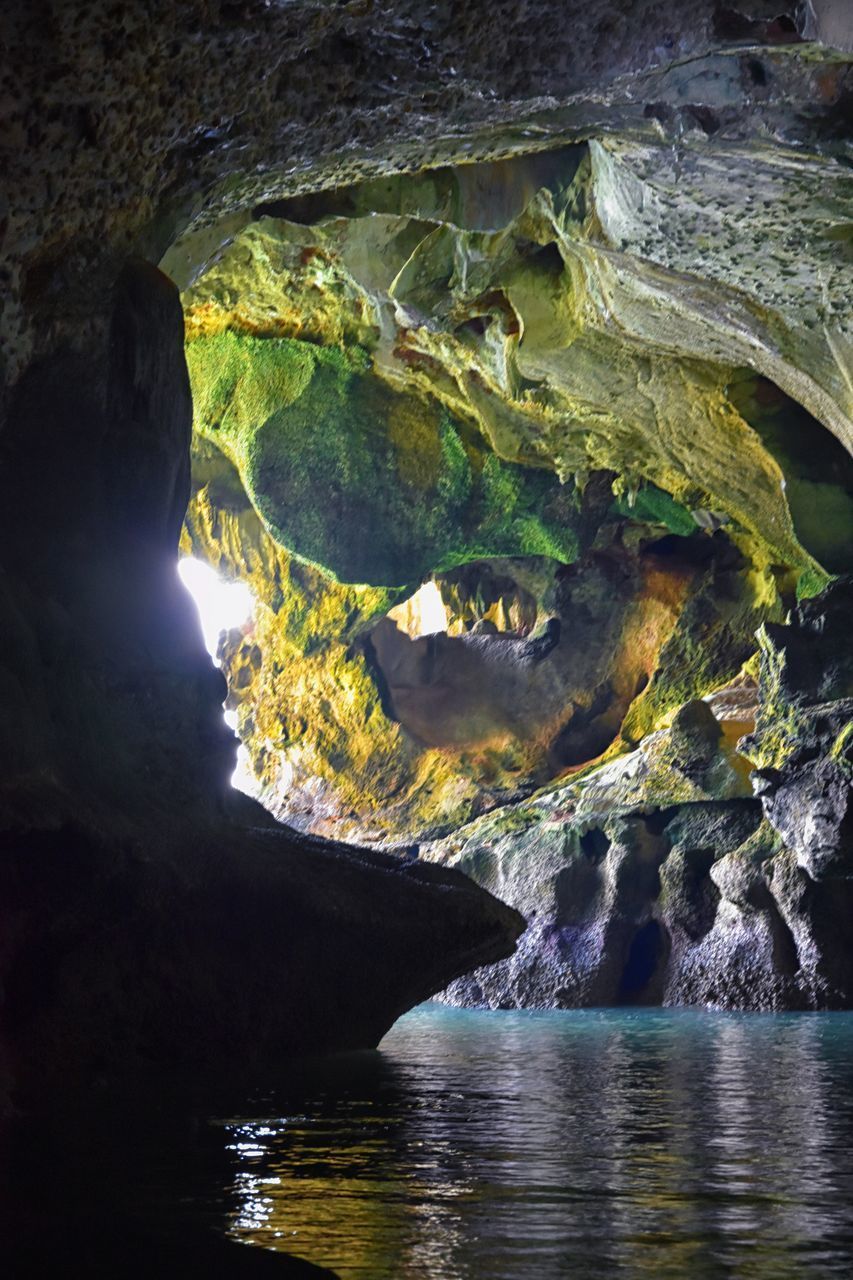 SCENIC VIEW OF CAVE AND ROCK FORMATION